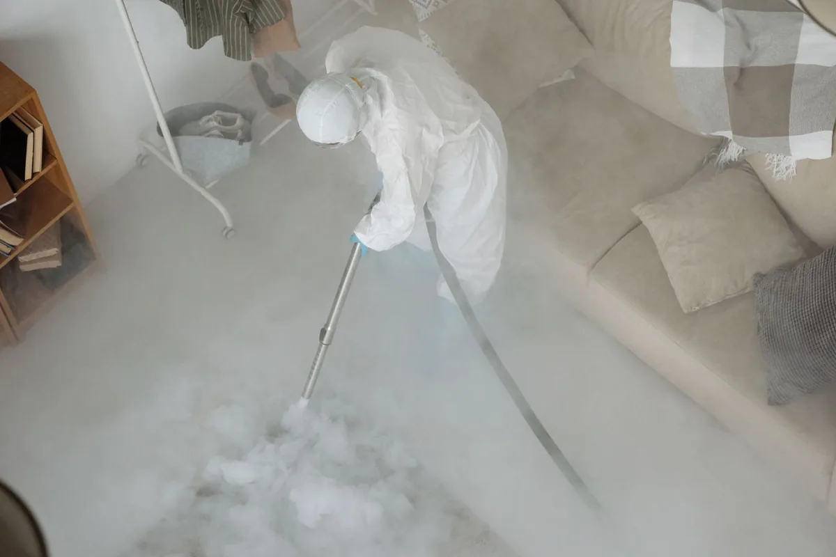 Biohazard cleanup technician in protective equipment, Christmas, FL